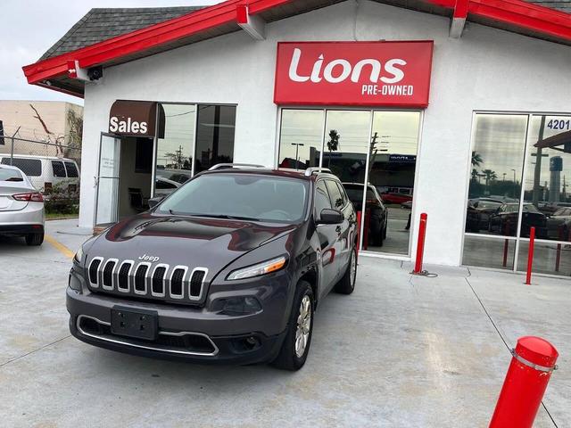 Photo of 2014 Eco Green Pearlcoat Jeep Cherokee