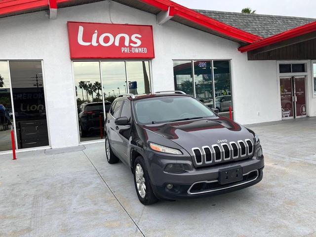 Photo of 2014 Eco Green Pearlcoat Jeep Cherokee