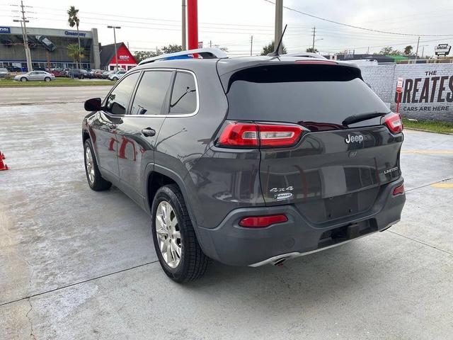 Photo of 2014 Eco Green Pearlcoat Jeep Cherokee