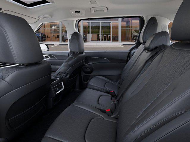 Photo of 2026 Snow White Pearl Kia Carnival Hybrid