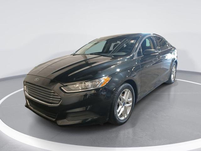 Photo of 2014 Tuxedo Black Metallic Ford Fusion