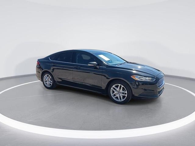 Photo of 2014 Tuxedo Black Metallic Ford Fusion