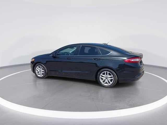 Photo of 2014 Tuxedo Black Metallic Ford Fusion
