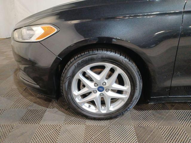 Photo of 2014 Tuxedo Black Metallic Ford Fusion