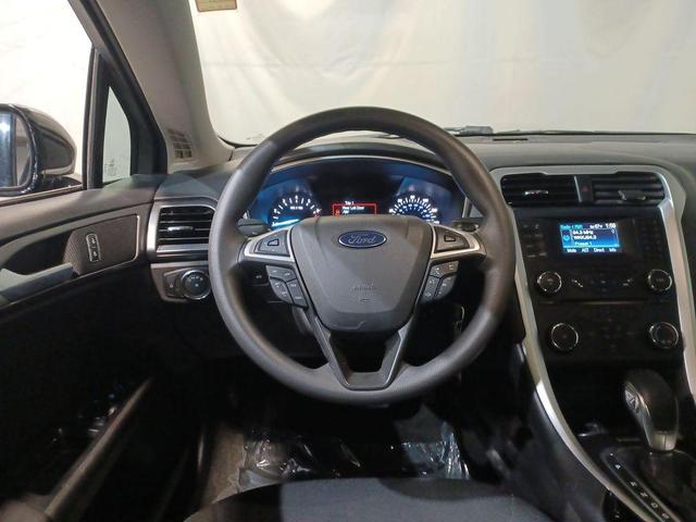 Photo of 2014 Tuxedo Black Metallic Ford Fusion