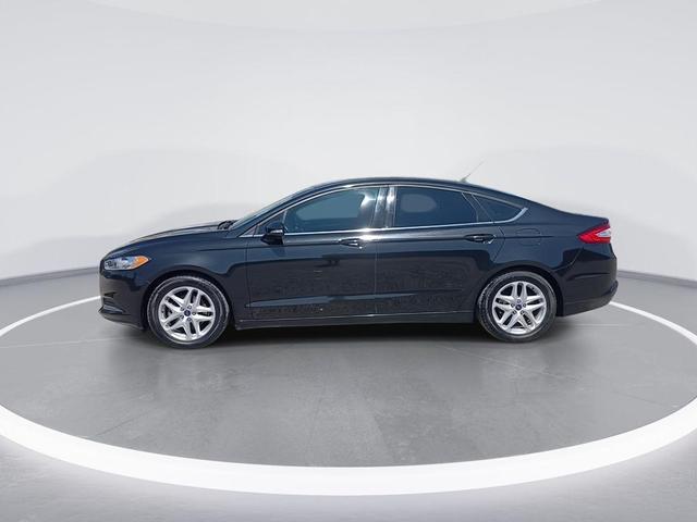 Photo of 2014 Tuxedo Black Metallic Ford Fusion