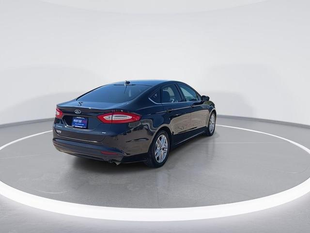Photo of 2014 Tuxedo Black Metallic Ford Fusion