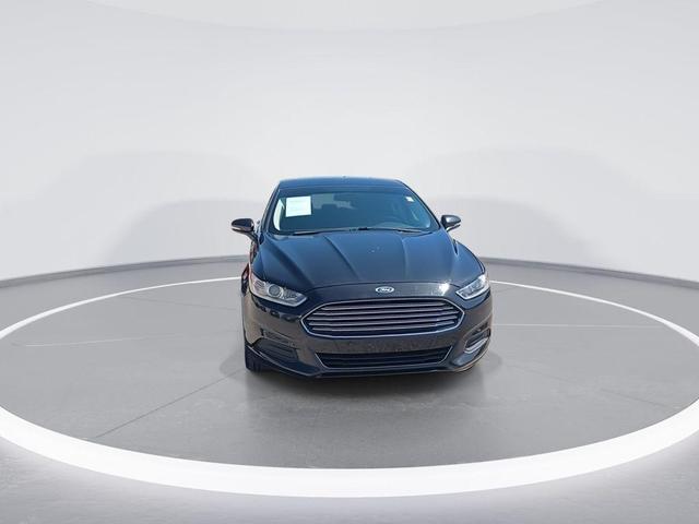 Photo of 2014 Tuxedo Black Metallic Ford Fusion