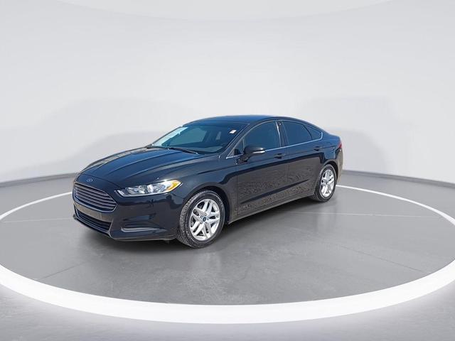 Photo of 2014 Tuxedo Black Metallic Ford Fusion