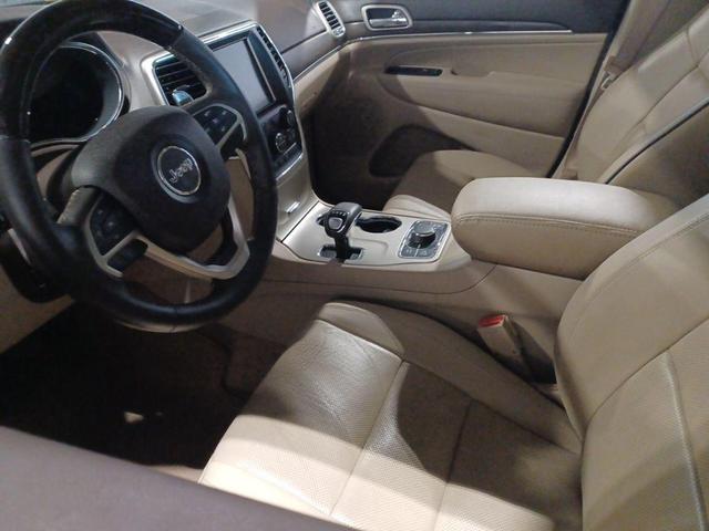 Photo of 2015 Deep Cherry Red Crystal Pearlcoat Jeep Grand Cherokee