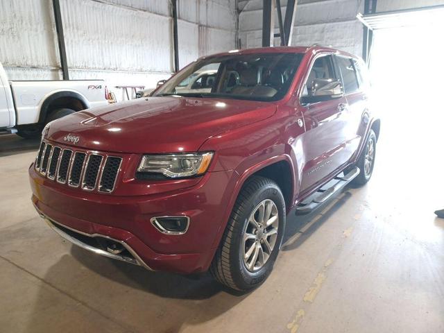 Photo of 2015 Deep Cherry Red Crystal Pearlcoat Jeep Grand Cherokee