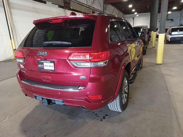 Photo of 2015 Deep Cherry Red Crystal Pearlcoat Jeep Grand Cherokee