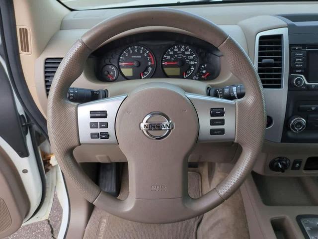Photo of 2015 Glacier White Nissan Frontier