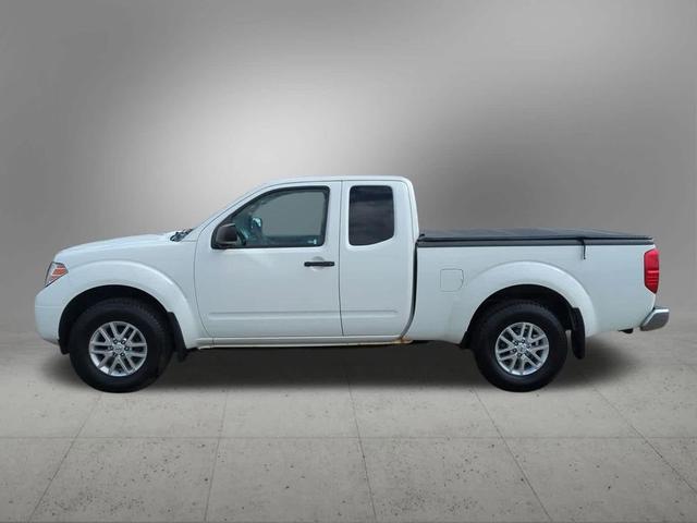 Photo of 2015 Glacier White Nissan Frontier