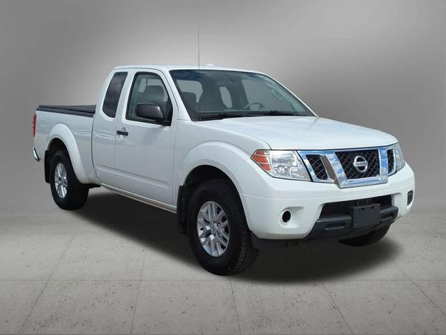 Photo of 2015 Glacier White Nissan Frontier