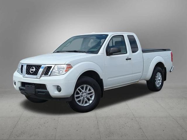 Photo of 2015 Glacier White Nissan Frontier