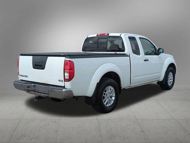 Photo of 2015 Glacier White Nissan Frontier