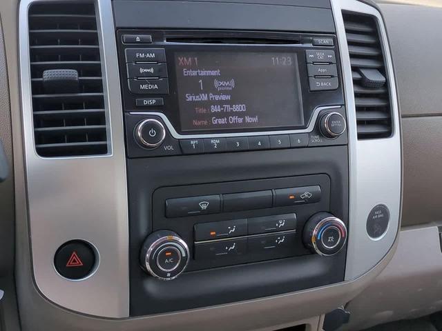 Photo of 2015 Glacier White Nissan Frontier