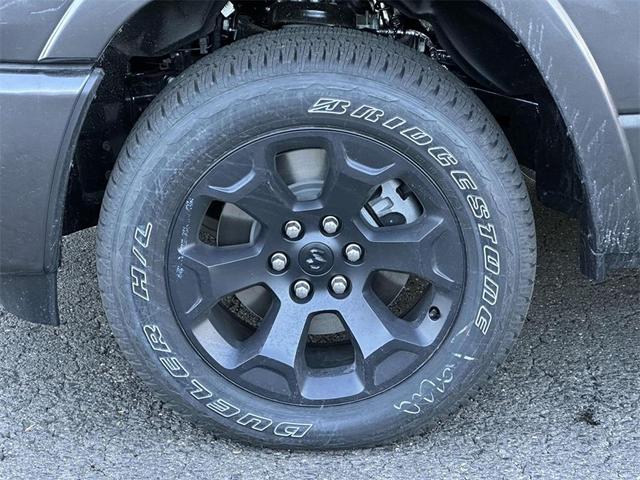 Photo of 2025 Granite Crystal Clearcoat Metallic RAM 1500