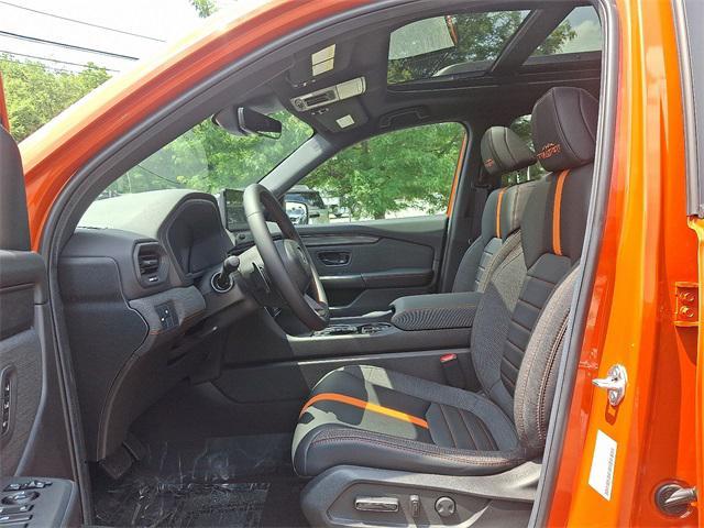Photo of 2026 Sunset Orange Honda Passport