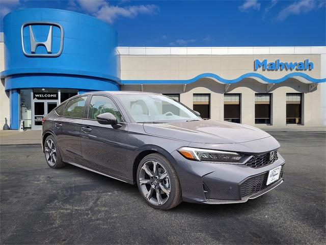 Photo of 2026 Meteorite Gray Metallic Honda Civic Hybrid