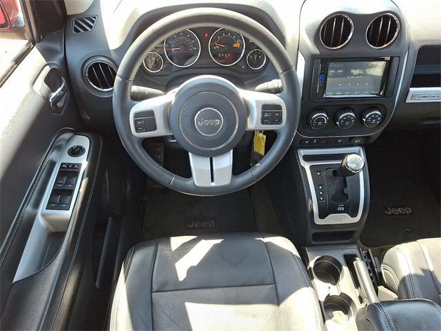 Photo of 2016 Deep Cherry Red Crystal Pearlcoat Jeep Compass