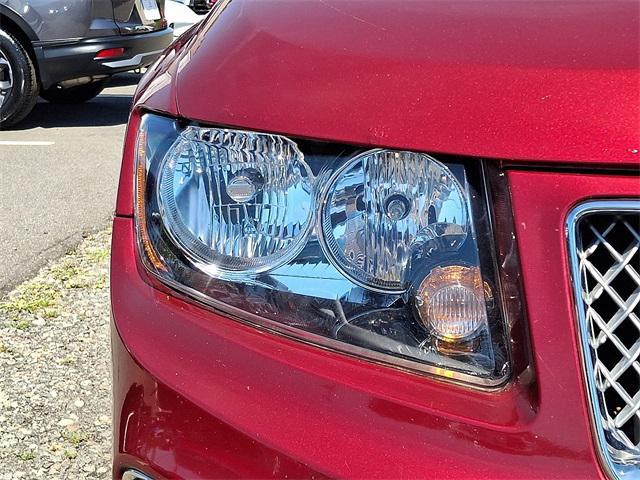 Photo of 2016 Deep Cherry Red Crystal Pearlcoat Jeep Compass