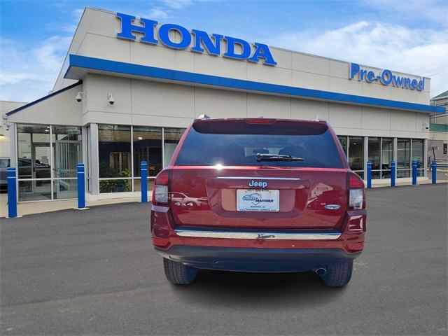 Photo of 2016 Deep Cherry Red Crystal Pearlcoat Jeep Compass