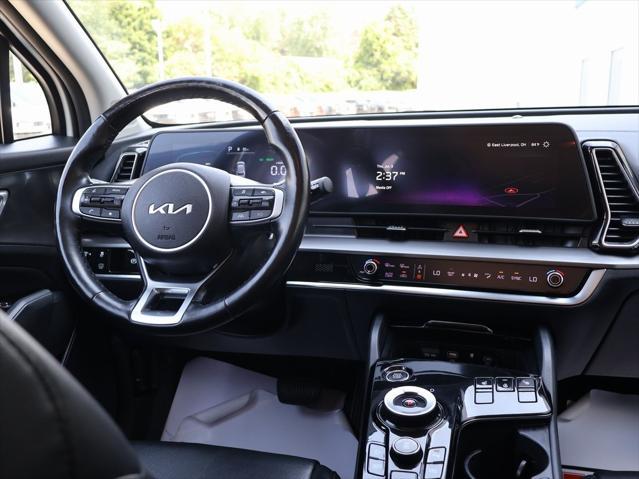 Photo of 2023 Snow White Pearl Kia Sportage Hybrid
