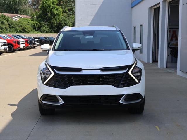 Photo of 2023 Snow White Pearl Kia Sportage Hybrid