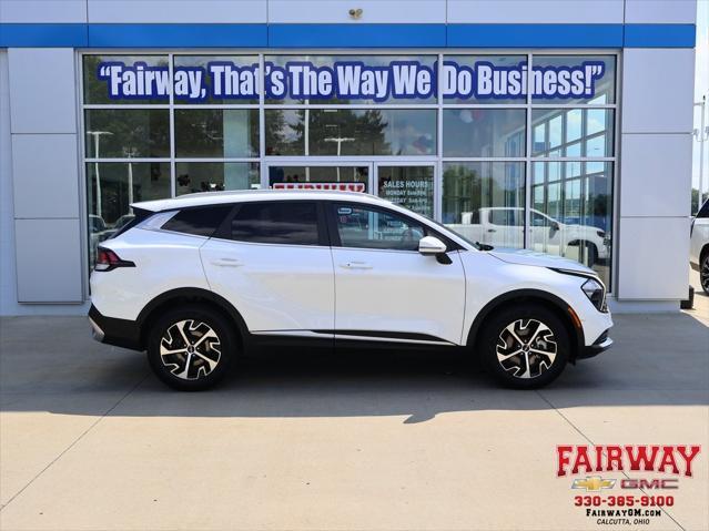 Photo of 2023 Snow White Pearl Kia Sportage Hybrid
