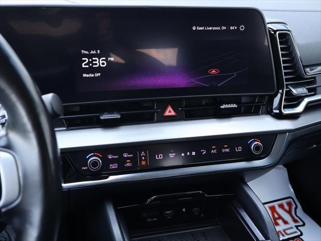 Photo of 2023 Snow White Pearl Kia Sportage Hybrid