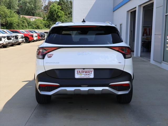 Photo of 2023 Snow White Pearl Kia Sportage Hybrid