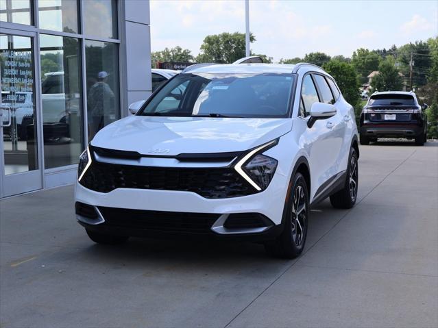 Photo of 2023 Snow White Pearl Kia Sportage Hybrid