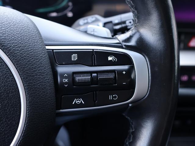 Photo of 2023 Snow White Pearl Kia Sportage Hybrid