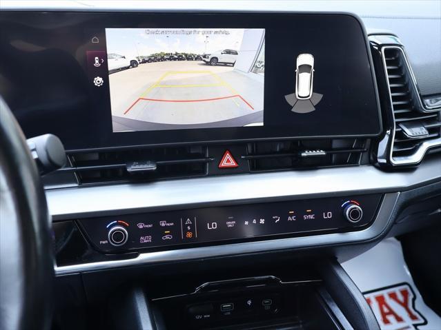 Photo of 2023 Snow White Pearl Kia Sportage Hybrid