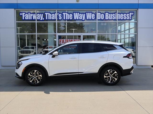 Photo of 2023 Snow White Pearl Kia Sportage Hybrid