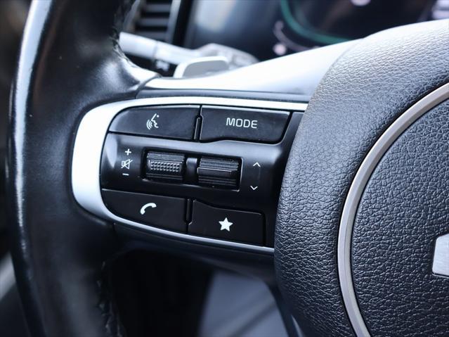 Photo of 2023 Snow White Pearl Kia Sportage Hybrid