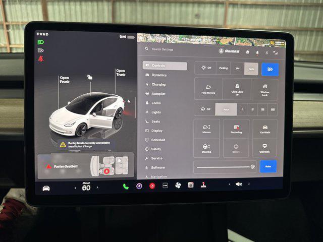 Photo of 2023 White Tesla Model 3