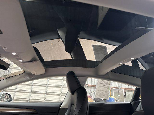 Photo of 2023 White Tesla Model 3