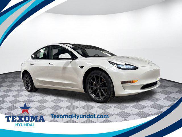 Photo of 2023 White Tesla Model 3