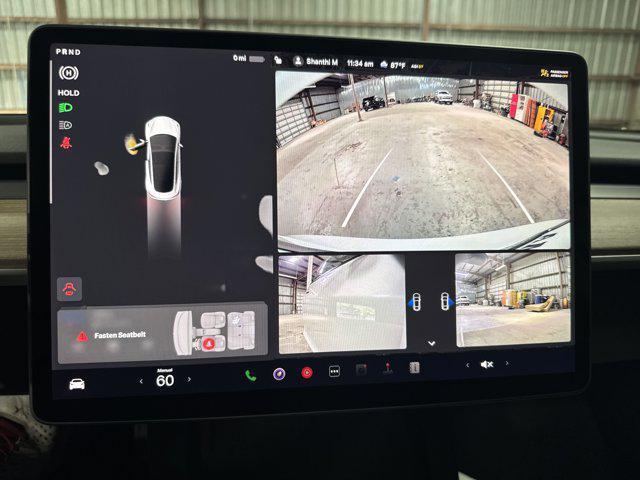 Photo of 2023 White Tesla Model 3