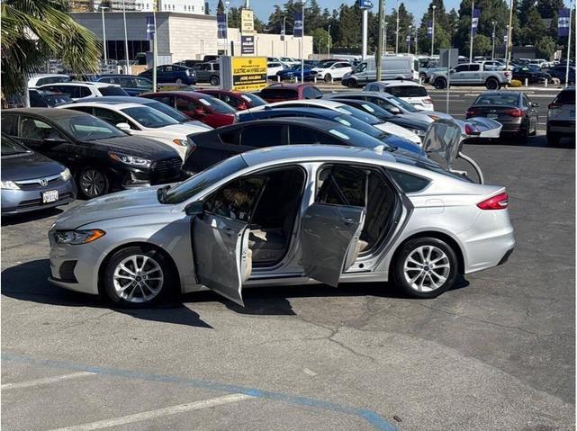 Photo of 2019 Ingot Silver Metallic Ford Fusion Hybrid