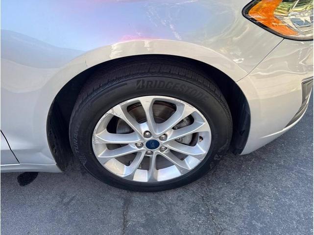 Photo of 2019 Ingot Silver Metallic Ford Fusion Hybrid