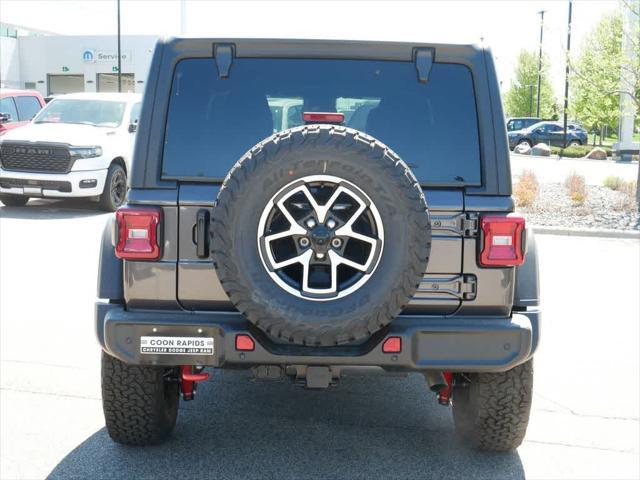 Photo of 2025 Granite Crystal Metallic Clearcoat Jeep Wrangler