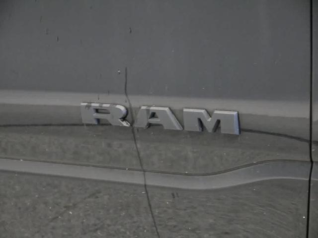 Photo of 2023 Diamond Black Crystal Pearlcoat RAM 1500