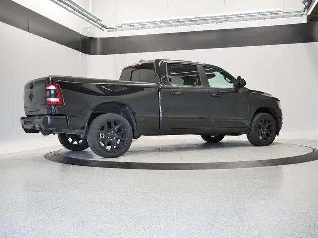 Photo of 2023 Diamond Black Crystal Pearlcoat RAM 1500
