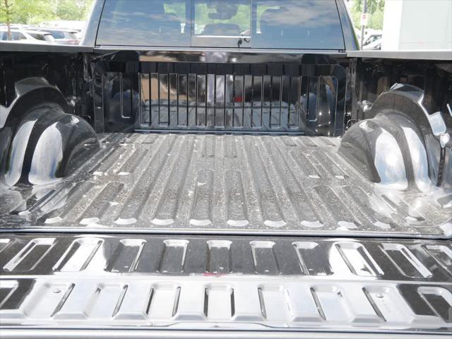 Photo of 2025 Diamond Black Crystal Pearlcoat RAM 1500
