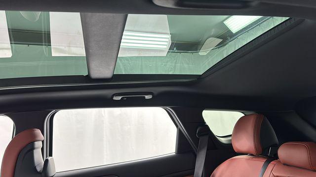 Photo of 2025 Fusion Black Kia Sportage Hybrid