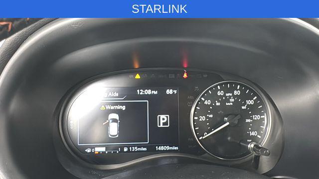 Photo of 2024 Scarlet Ember Tintcoat/Super Black Nissan Kicks